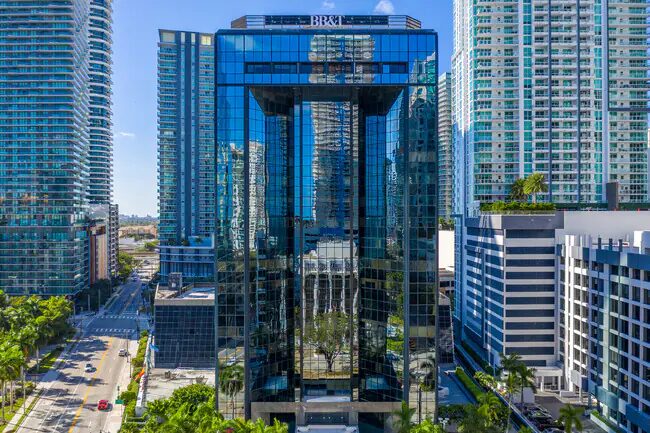 Glass office tower in Miami's Brickell financial district, the kind of building assessed during Miami security consulting engagements