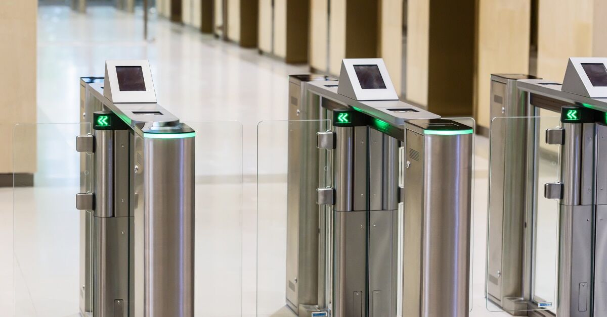 Optical turnstile access gates in a technology company office lobby